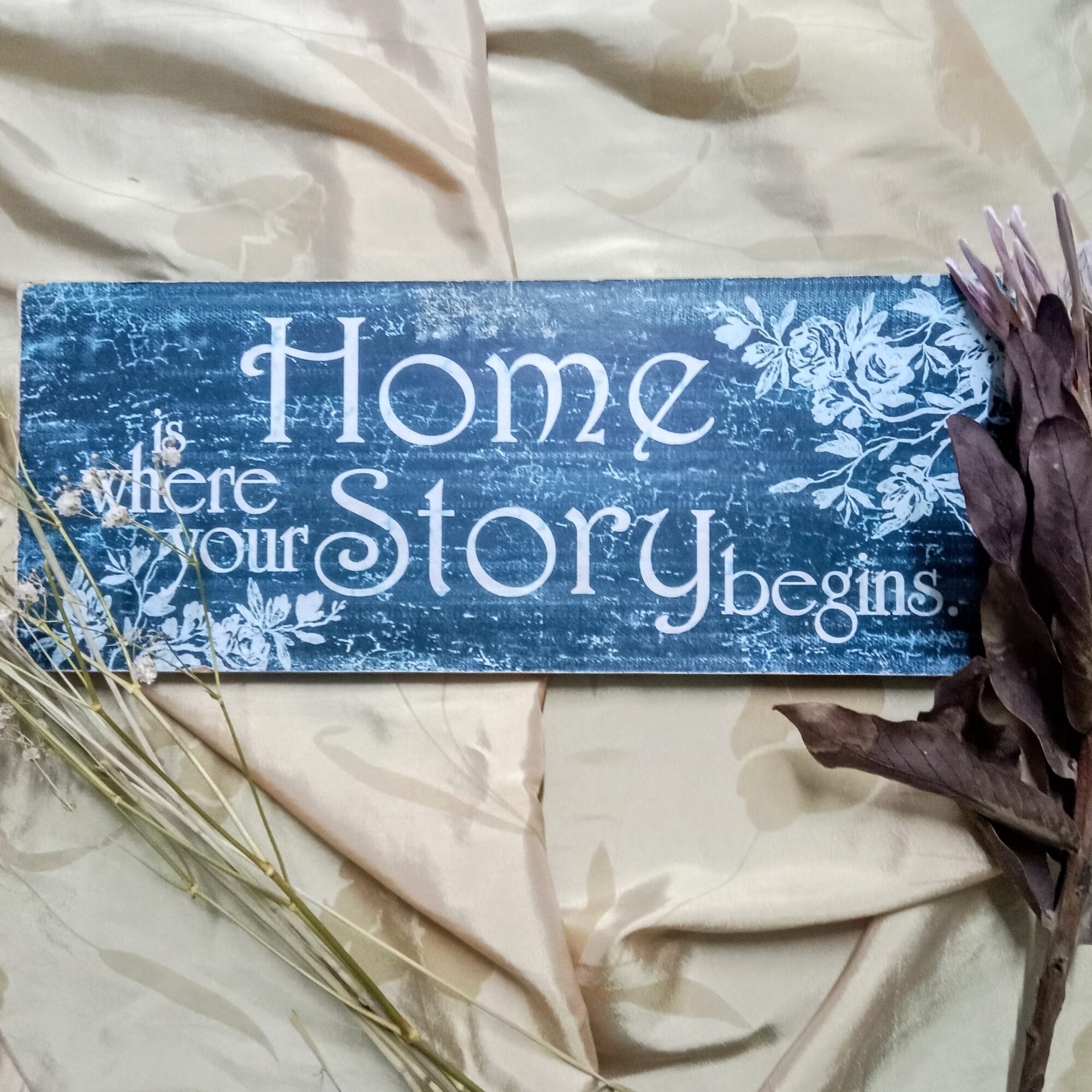 Home is where your story begins sign