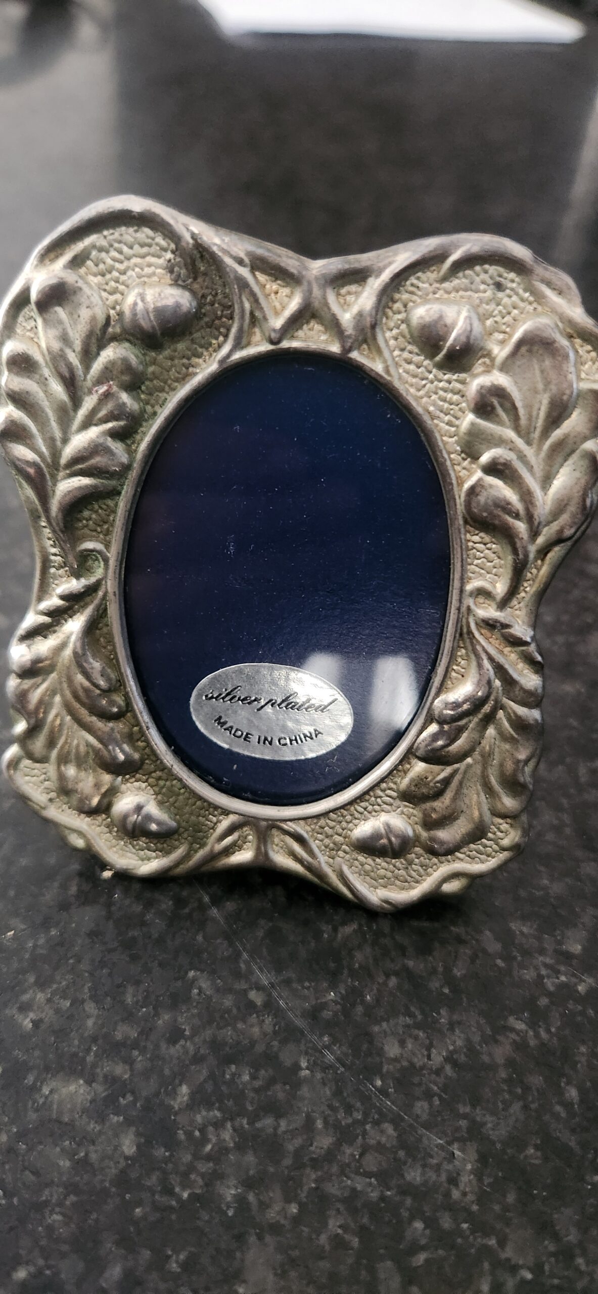 Acorn adorned silver plated frame with glass
